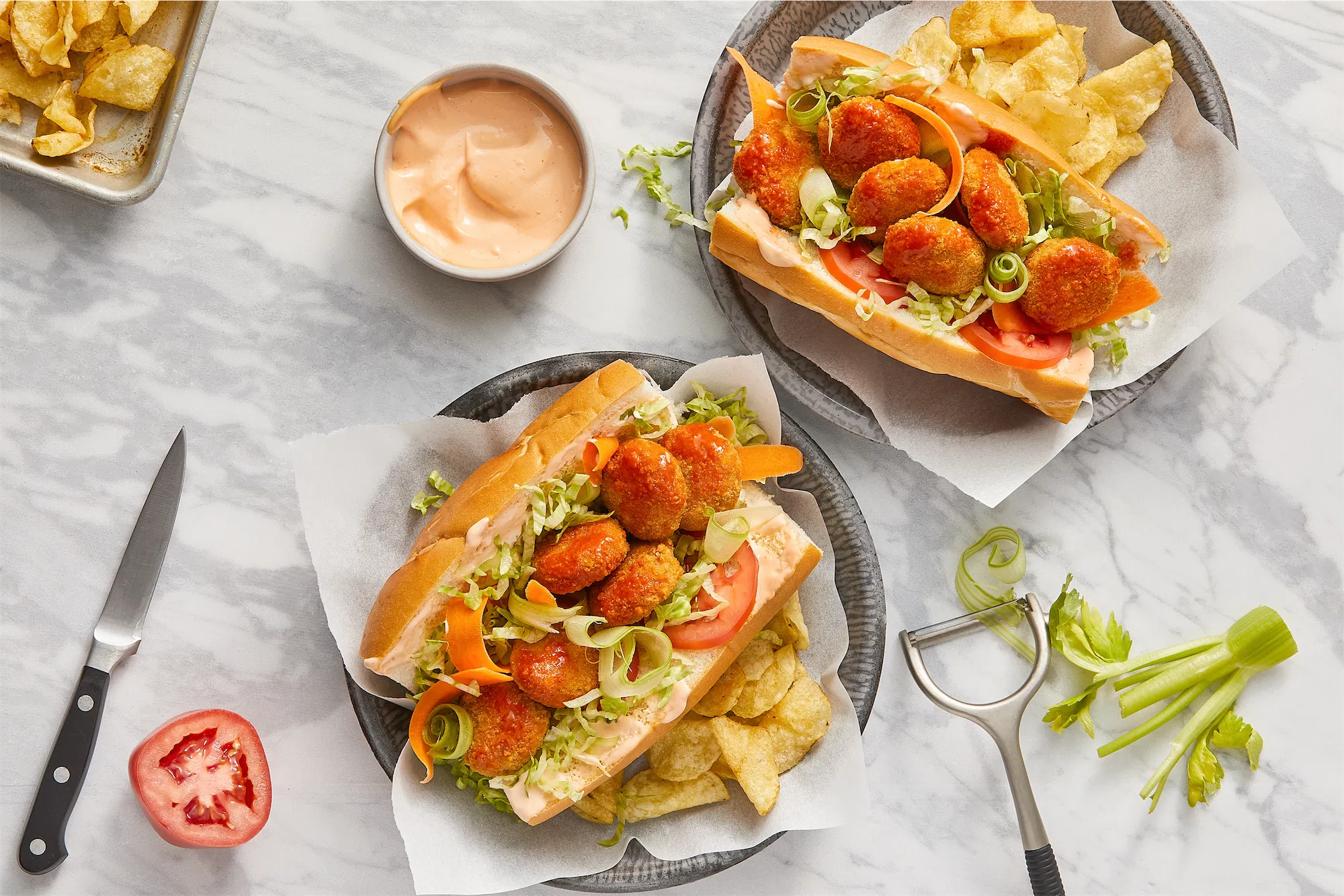 chicken nugget po-boy sandwich with celery and remoulade sauce