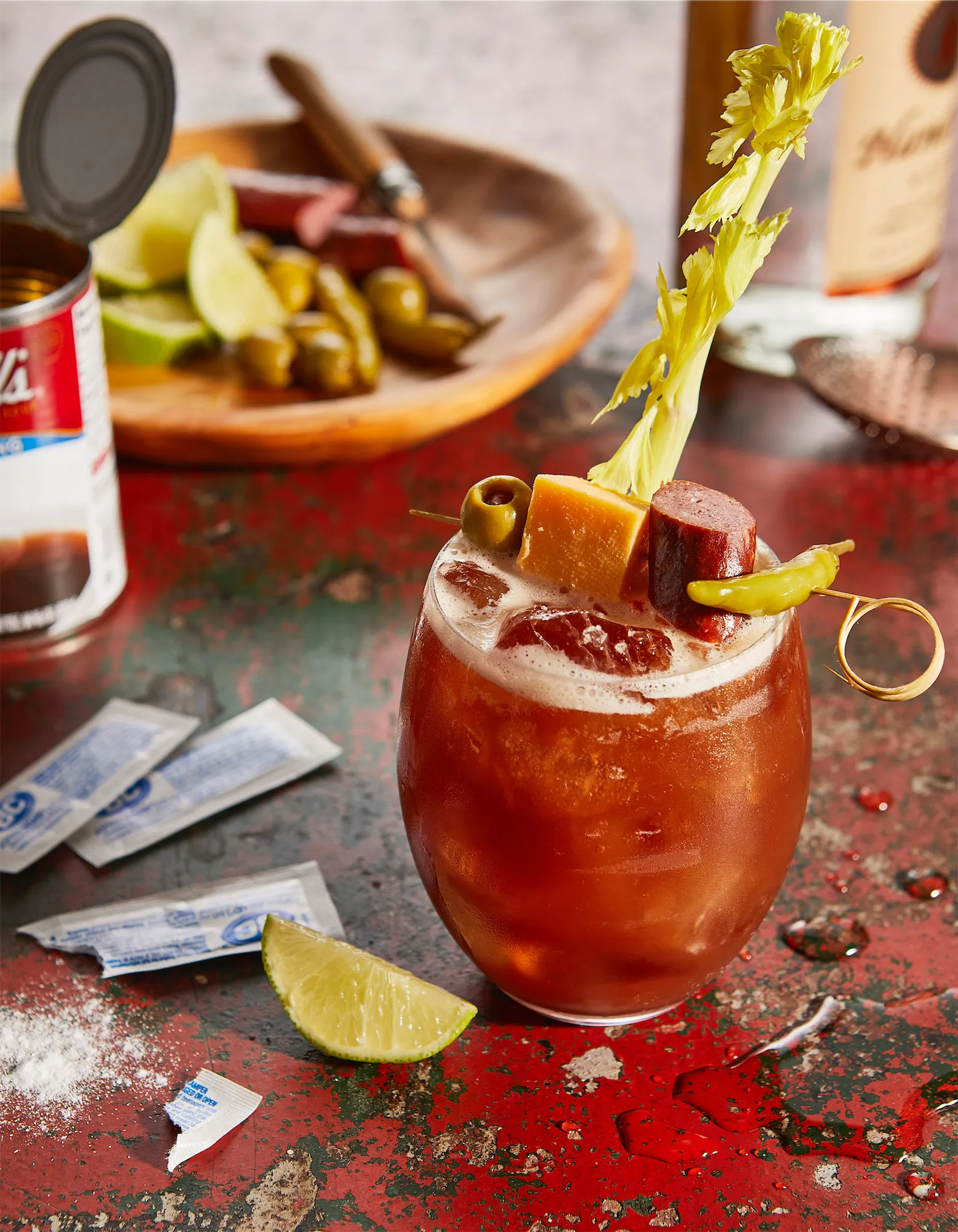 Andy Murray cookbook cocktail recipe bloody mary bull garnished with celery sausage and cheese and made with campbell's soup
