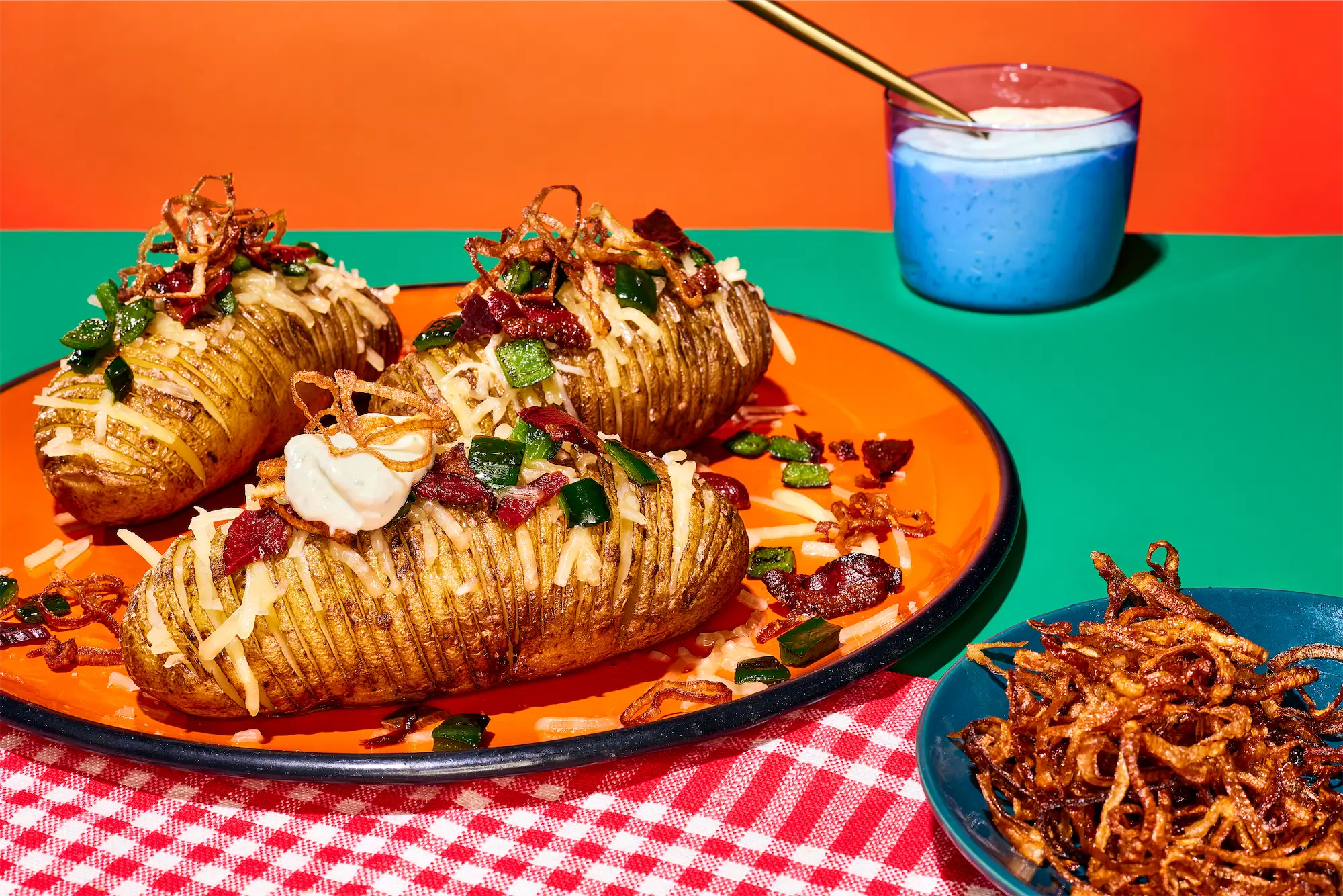 Cabot brand recipe hasselback potatoes loaded with bacon crispy onions and sour cream
