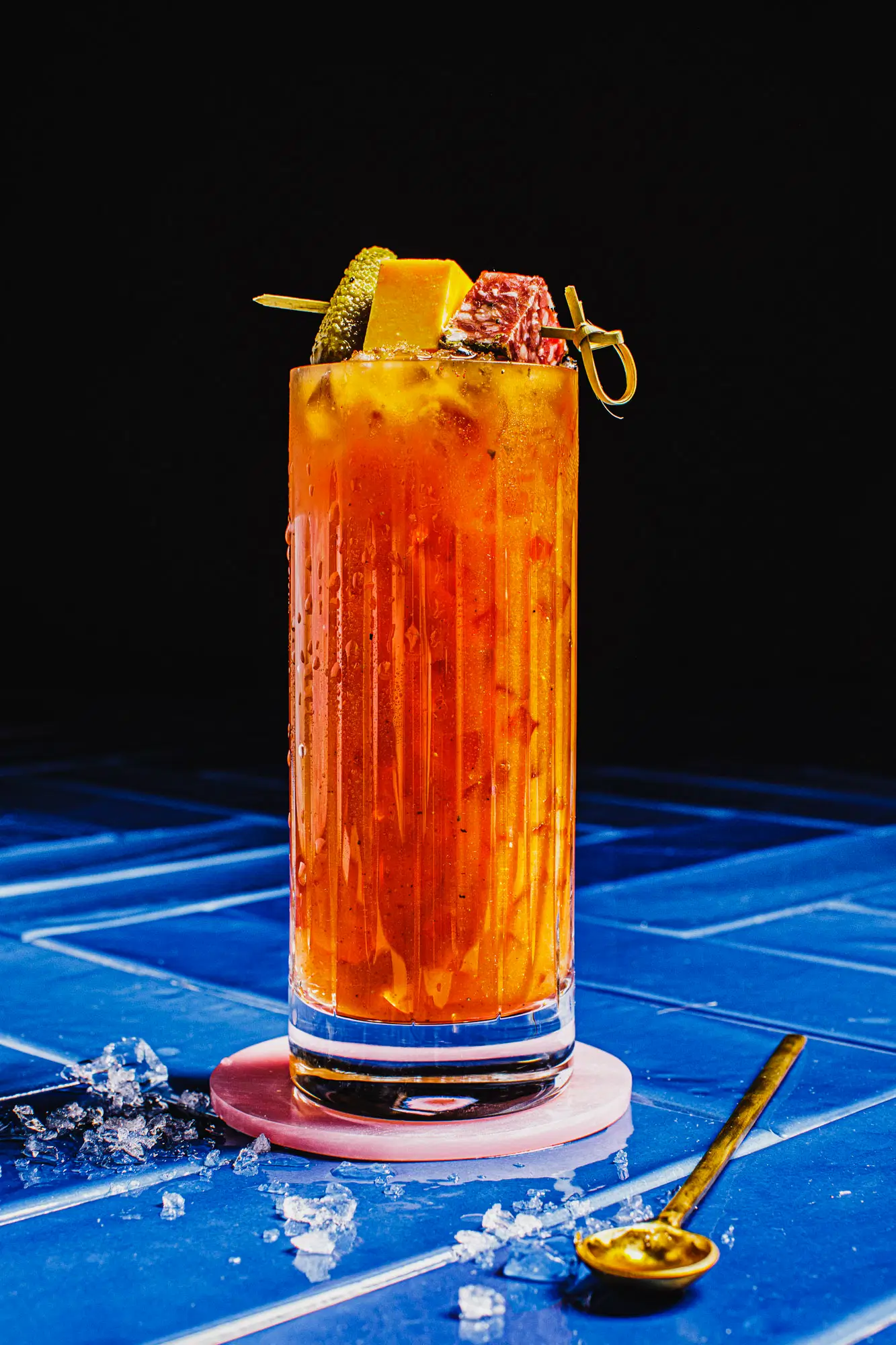 Chicago magazine cover shot of bloody mary cocktail in a collins glass with an antipasti skewer garnish