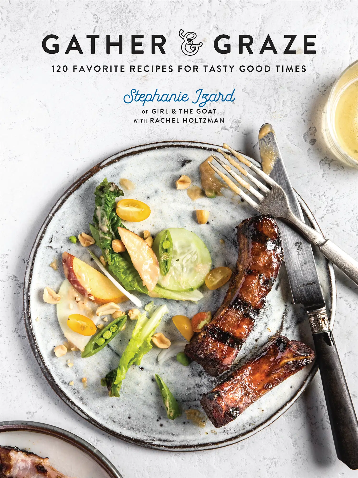 Stephanie Izard gather and graze cookbook cover showing ribs and a salad on a white plate with knife and fork on white background