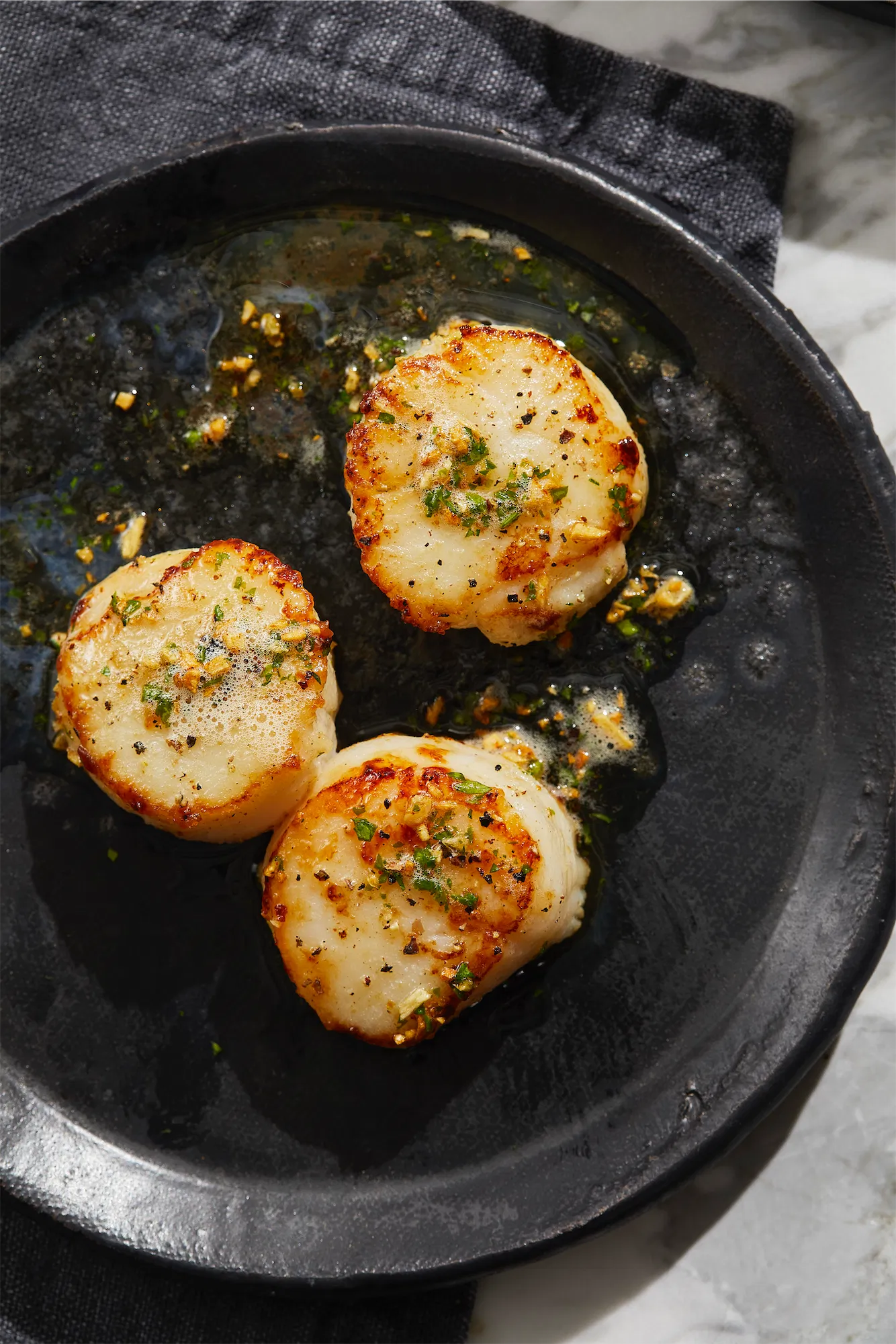 Andy murray cookbooks seared scallops on black plate