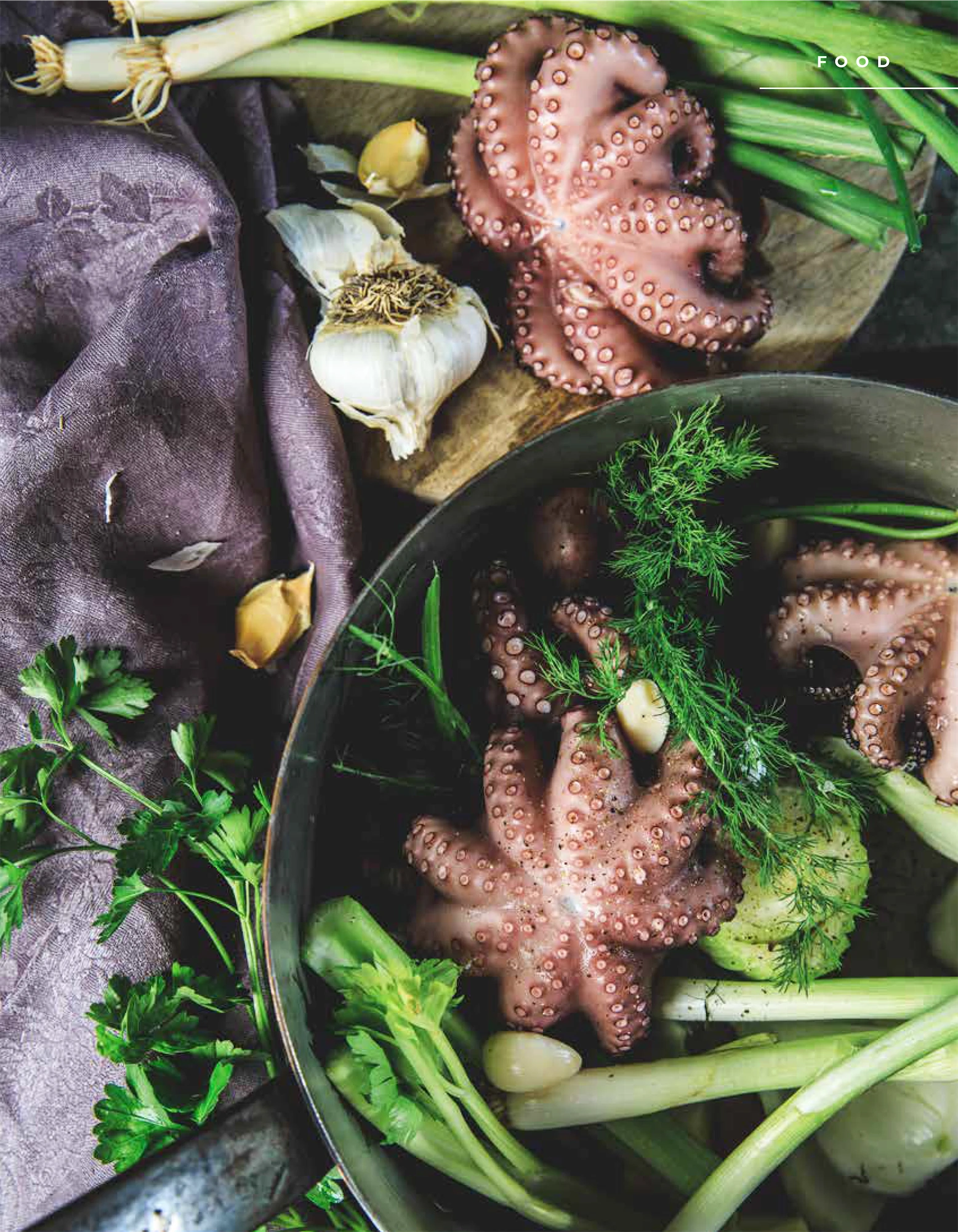 baby ocyopus in a saucepan with onions and herbs garlic