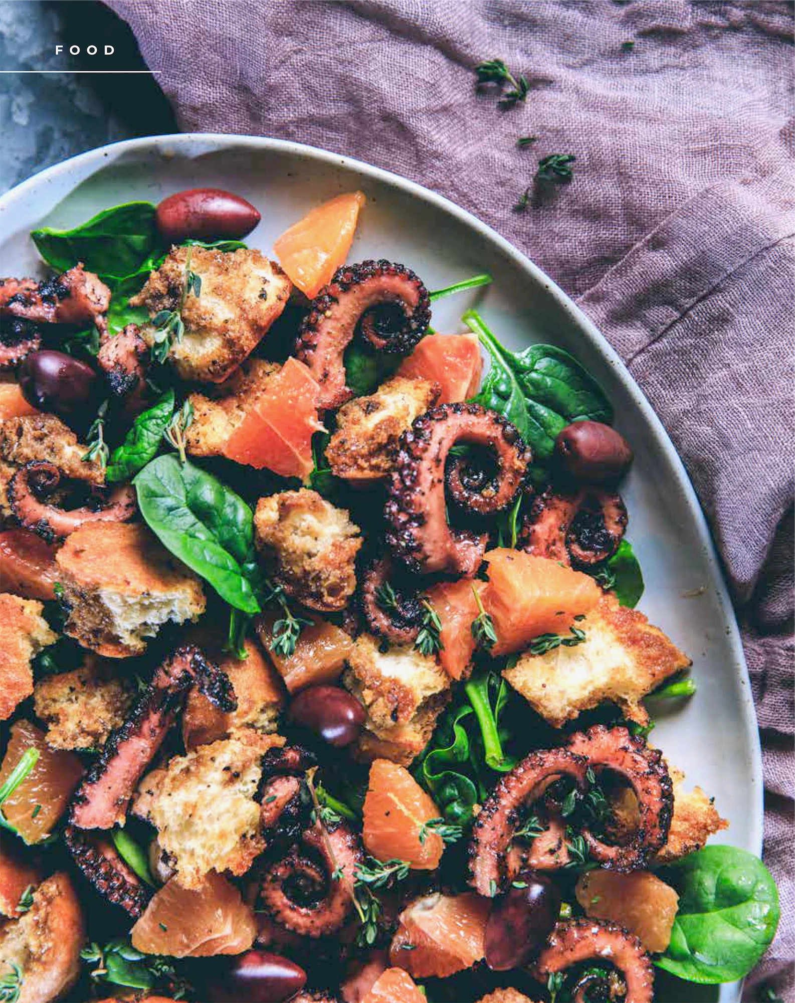 salad of octopus grapefruit black olives baby spinach snd fresh croutons