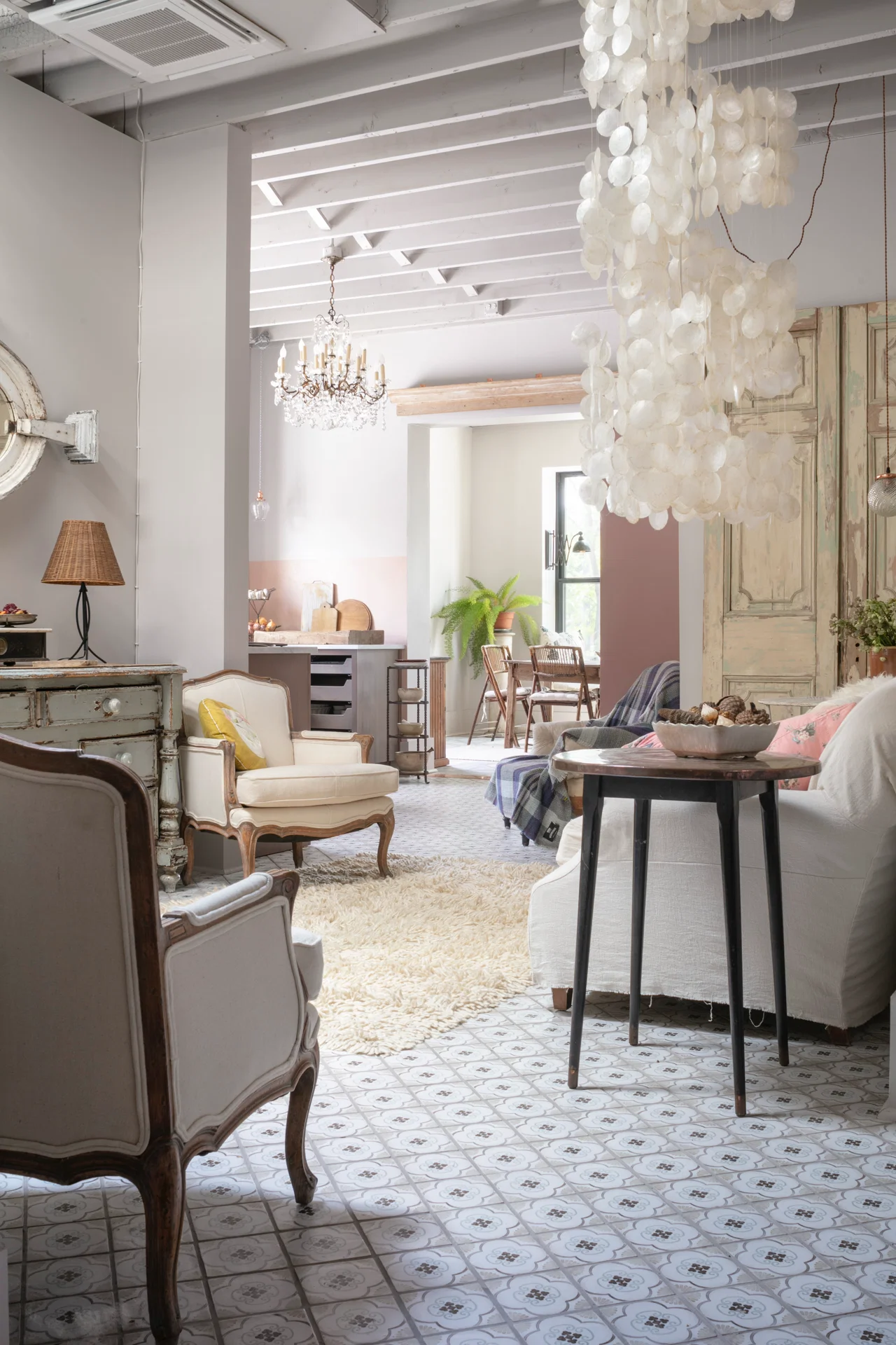 interior scene salon living room tiled floor chandelier ceiling beams vintage furniture white cream